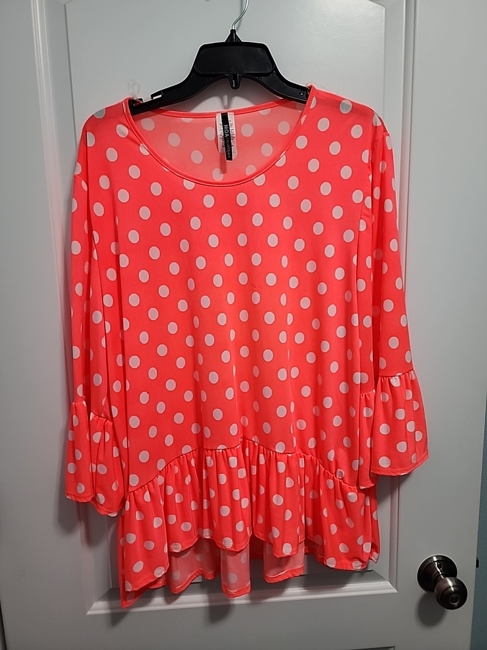 Polka Dot Ruffle-Hem Tunic Top in Coral